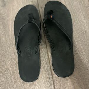 Rainbow leather black flip flops